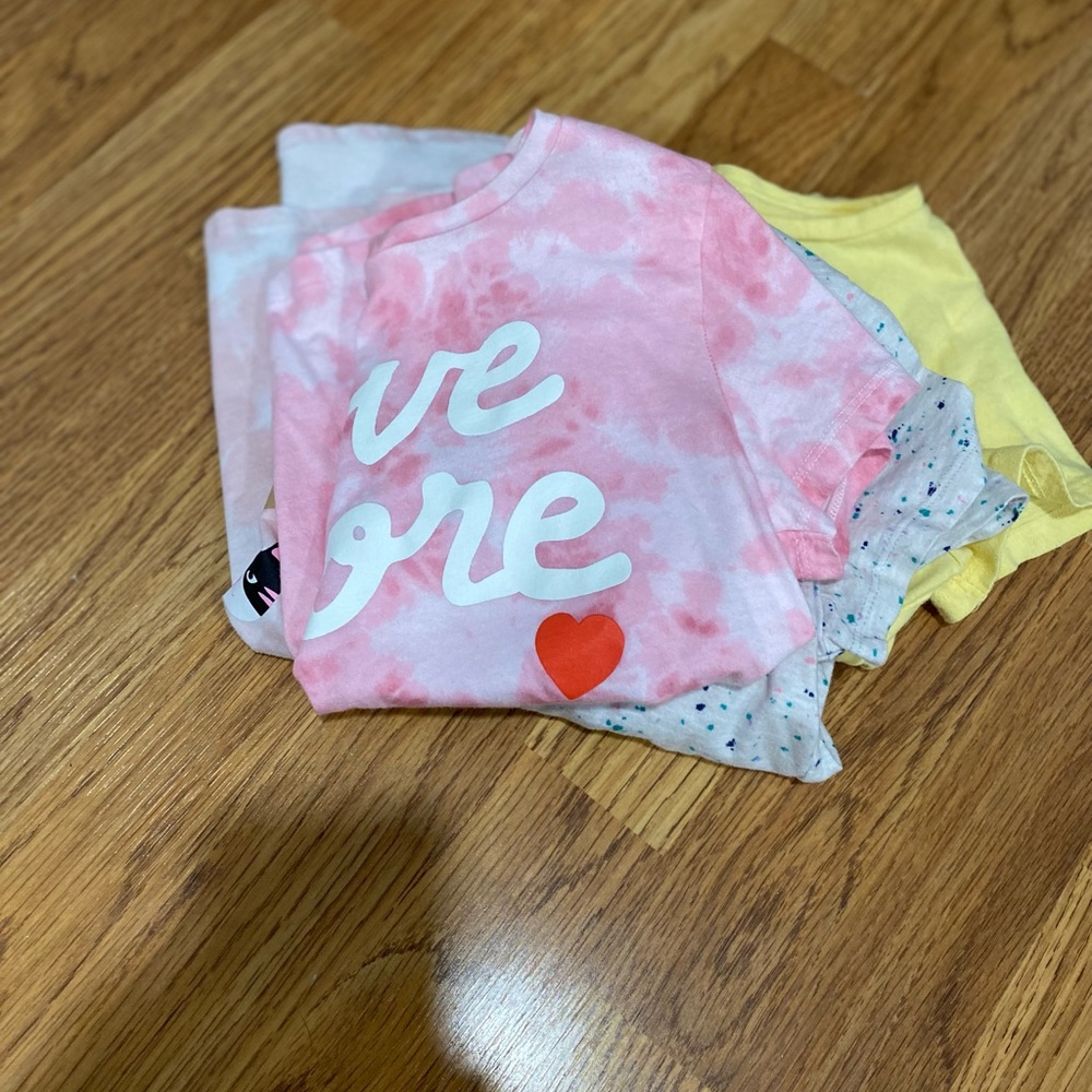 • bundle of four girls shirts •